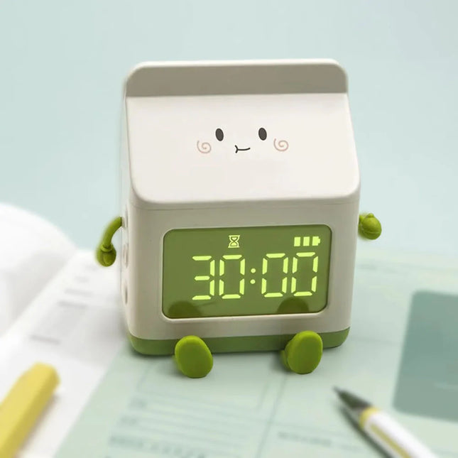 Dětský budík ve tvaru krabice mléka