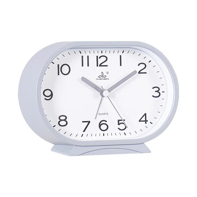 Oválný analogový budík s jednoduchým designem