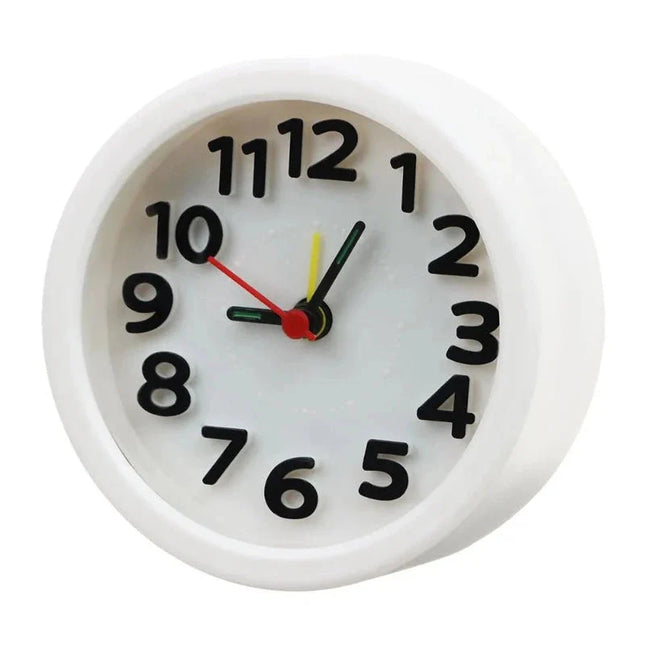 Malý kulatý analogový budík na cesty