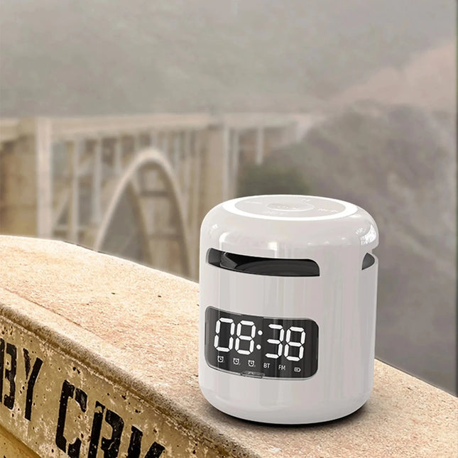 Malý přenosný budík propojitelný s telefonem
