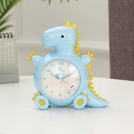 Dětský analogový budík ve tvaru dinosaura