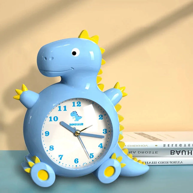 Dětský analogový budík ve tvaru dinosaura