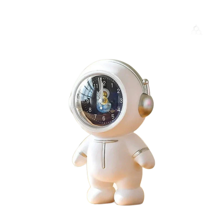 Dětský analogový budík ve tvaru astronauta
