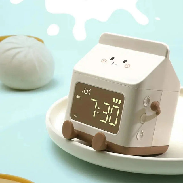 Dětský budík ve tvaru krabice mléka