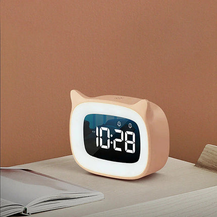 Růžový dětský budík pro nácvik spánku