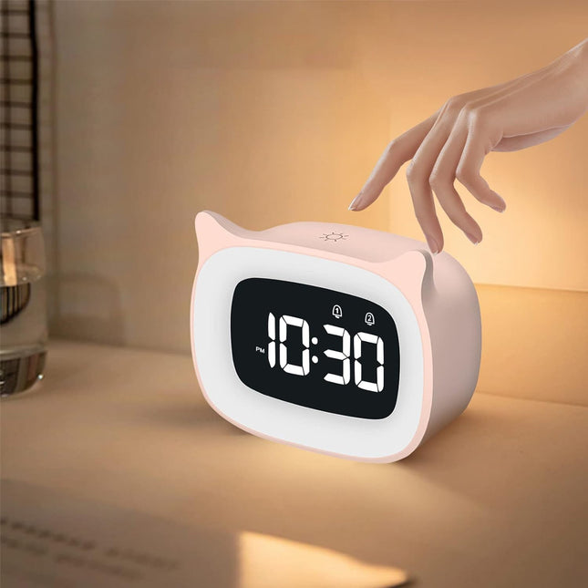 Růžový dětský budík pro nácvik spánku