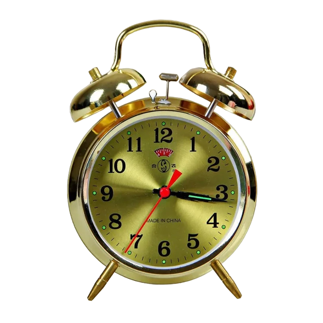 Zlatý vintage mechanický budík se zvonky