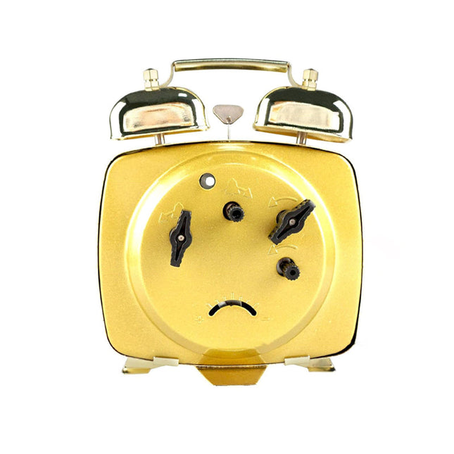 Malý mechanický budík v retro stylu