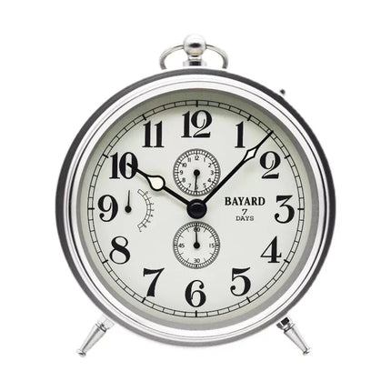 Vintage mechanický budík v retro designu