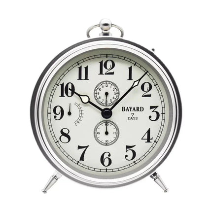 Vintage mechanický budík v retro designu